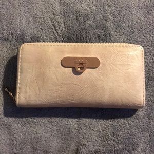 This is a tan wallet